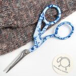 Nožnice Borduurschaar pri strihaní pleteniny