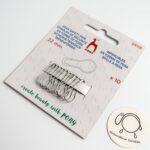 Balenie 10 kovových značkovačov Pony 22mm pre pletenie