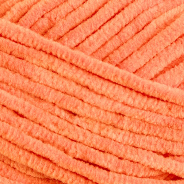 Vzorka svetlooranžovej priadze vhodnej na hračky