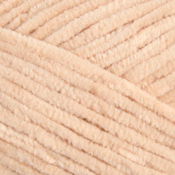 Vzorka béžovej priadze vhodnej na detské hračky