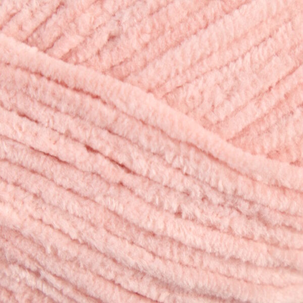 Vzorka svetloružovej mäkkej priadze na hračky